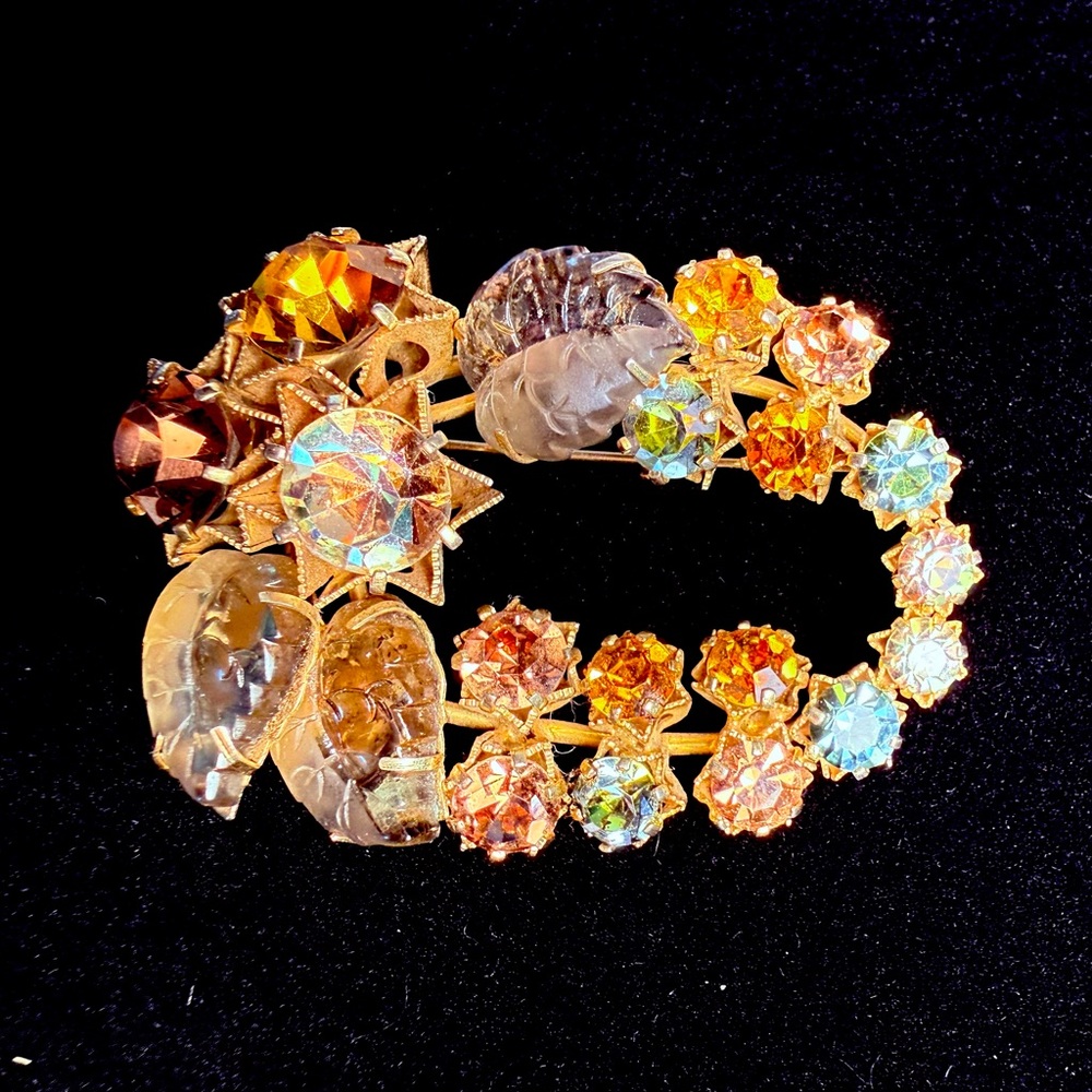 Austrian Brooch Molded Glass leaf, AB rhinestone, Gold Tone, 6 pointed stars.